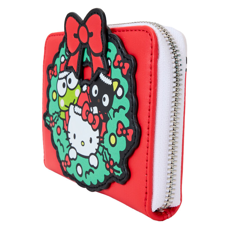 Intérieur du portefeuille Hello Kitty Noël montrant quatre emplacements pour cartes et doublure assortie