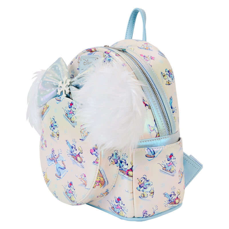 Poche avant du sac à dos avec fermeture à pression, ornée de détails irisés et embossés
