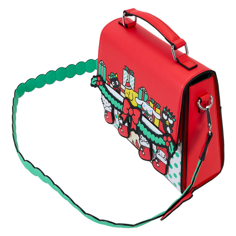 Détail des rivets mobiles et des éléments en métal argenté du sac bandoulière Hello Kitty Noël