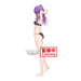 Vue latérale montrant la posture élégante et le maillot de bain pailleté de la figurine