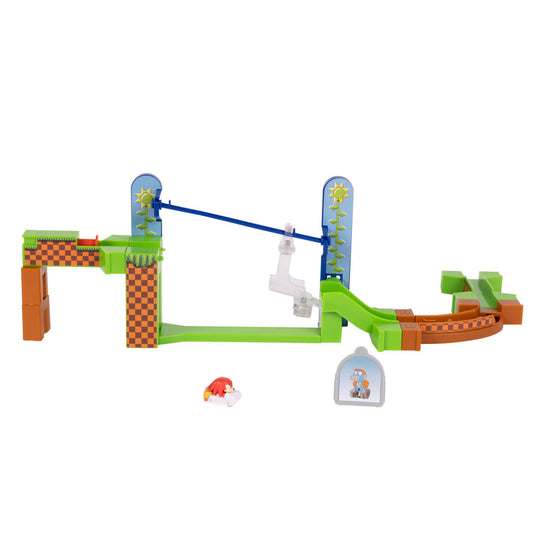 Vue latérale du playset mettant en valeur les éléments de décor et la piste