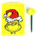 Stylo vert à l'effigie du Grinch avec motifs festifs sur fond blanc