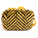 Image de la trousse vanity Le Roi Lion posée sur une surface blanche mettant en valeur ses dimensions compactes.