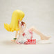 Vue arrière de la figurine Shinobu Oshino mettant en valeur la finition du costume
