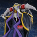 Gros plan sur le visage expressif et les yeux lumineux de la figurine Ainz Ooal Gown