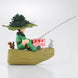 Gros plan sur le visage expressif de la figurine Gon Hunter x Hunter 11cm par BANPRESTO