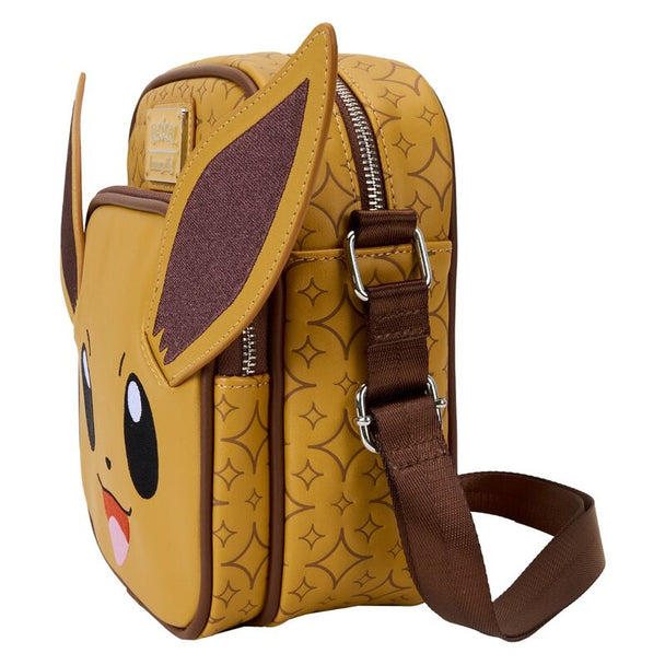 Côté du sac Pokémon Eevee montrant la bandoulière ajustable et la finition en métal argenté brillant.