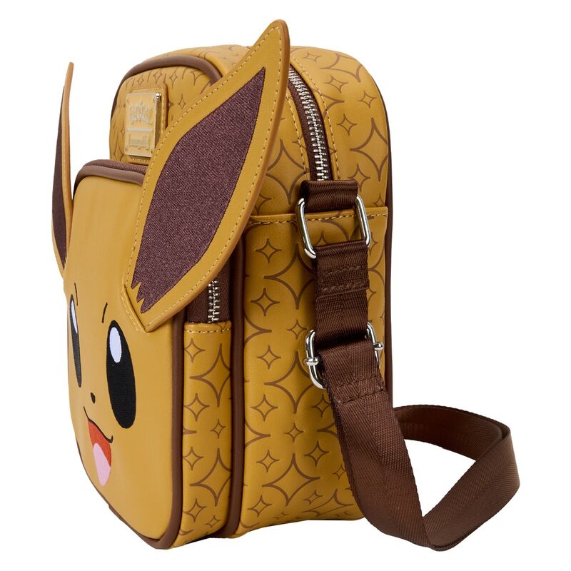 Côté du sac Pokémon Eevee montrant la bandoulière ajustable et la finition en métal argenté brillant.