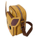 Détail des appliqués, broderies et embossages représentant Eevee sur le sac Loungefly.