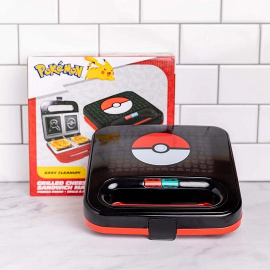 Gros plan sur la poignée ergonomique de la presse à panini Pokémon UNCANNY BRANDS