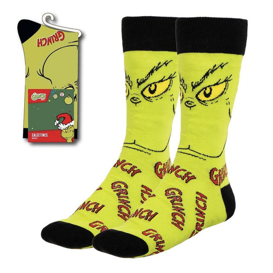Chaussettes adultes taille 38-45 à motif Grinch vert, fabriquées en coton doux par CERDÁ, vue rapprochée du design et des couleurs vibrantes.