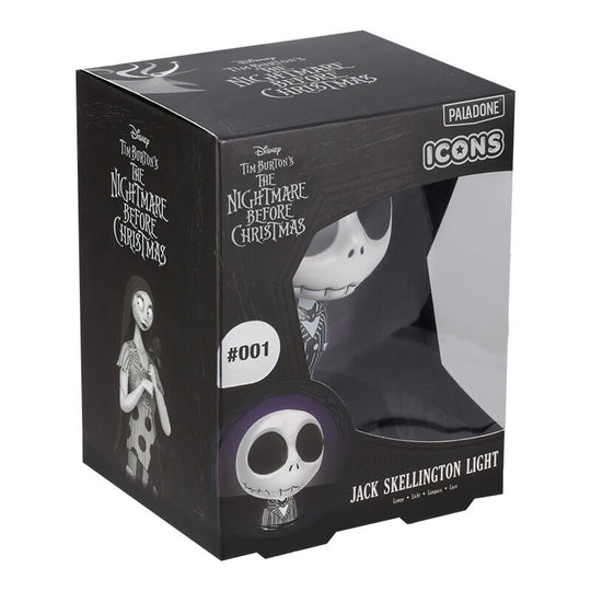 Lampe d'ambiance Jack Skellington posée sur une table de chevet avec piles AAA visibles