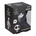 Lampe d'ambiance Jack Skellington posée sur une table de chevet avec piles AAA visibles