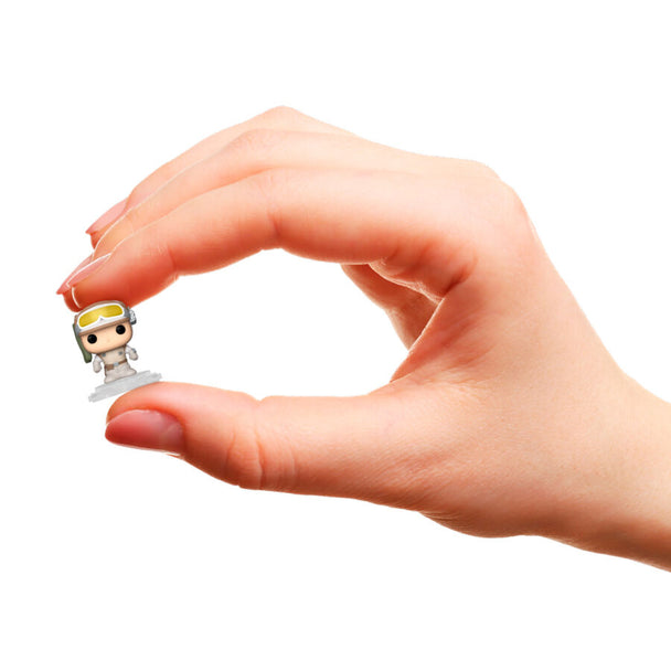 Blister contenant 4 figurines Bitty POP Star Wars, dont Luke Skywalker, dans un boîtier acrylique rigide