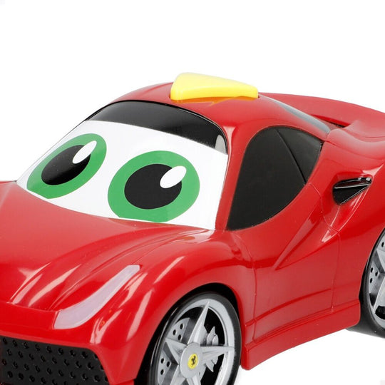 Voiture junior Ferrari BURAGO avec boutons de sons visibles sur le toit