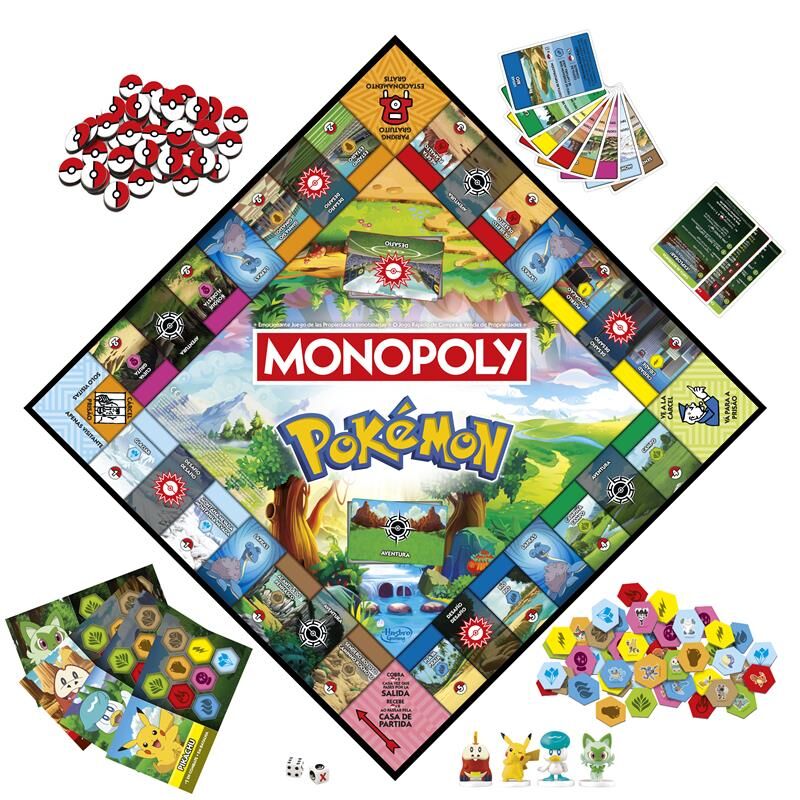 Cartes de propriété et cartes spéciales du jeu Monopoly Pokémon en espagnol visibles sur la table