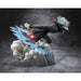 Profil gauche de la figurine Dandadan Okarun transformé montrant la posture dynamique