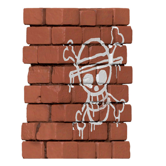 Profil latéral de la tirelire Luffy One Piece 16cm montrant la fente pour insérer les pièces
