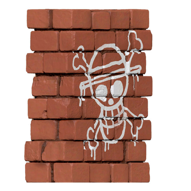 Profil latéral de la tirelire Luffy One Piece 16cm montrant la fente pour insérer les pièces