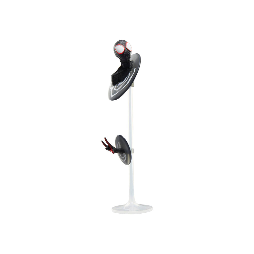 Accessoires inclus avec la figurine The Spot, comprenant mains alternatives et objets