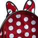 Sac à dos Loungefly Disney Minnie Bow posé sur une surface blanche avec éclairage naturel