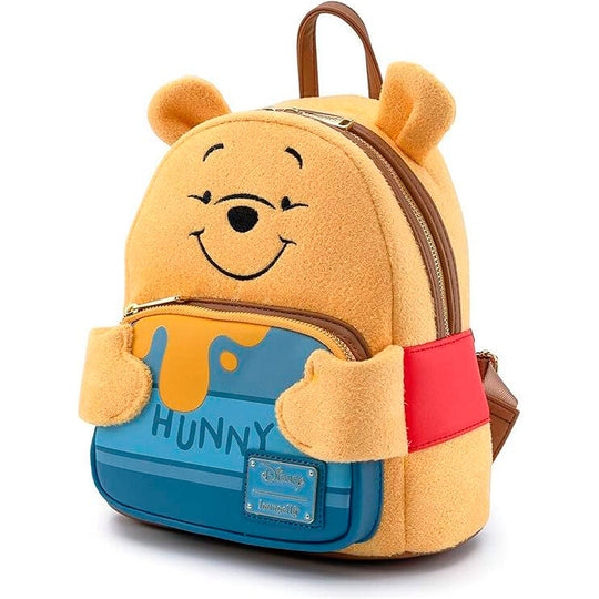 Sac à dos Loungefly Disney Winnie l'Ourson vu de côté montrant les dimensions compactes et la qualité des matériaux