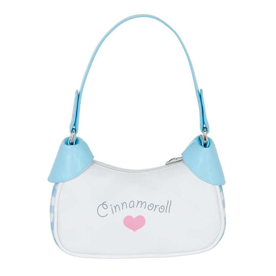 Détail du sac Hello Kitty Cinnamoroll montrant la fermeture éclair et la texture du tissu
