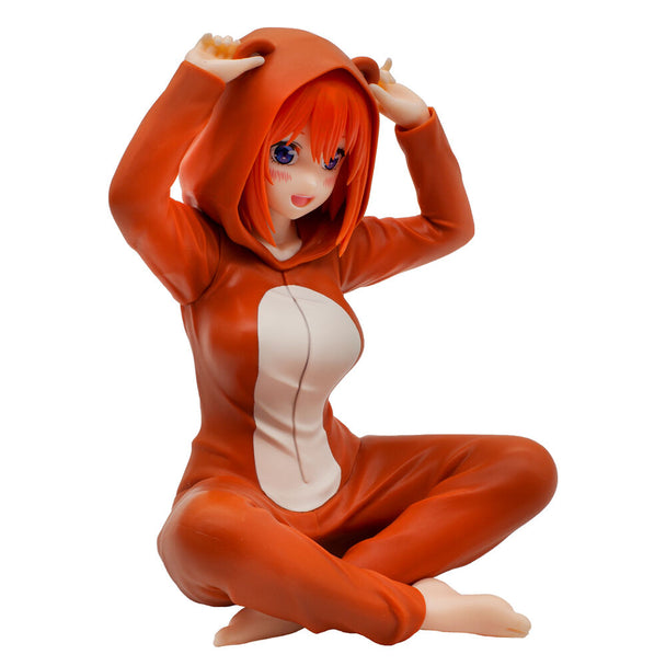 Gros plan sur le visage souriant de la figurine Yotsuba Nakano de The Quintessential Quintuplets