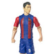 Figurine Lewandowski posée sur un socle avec éclairage studio
