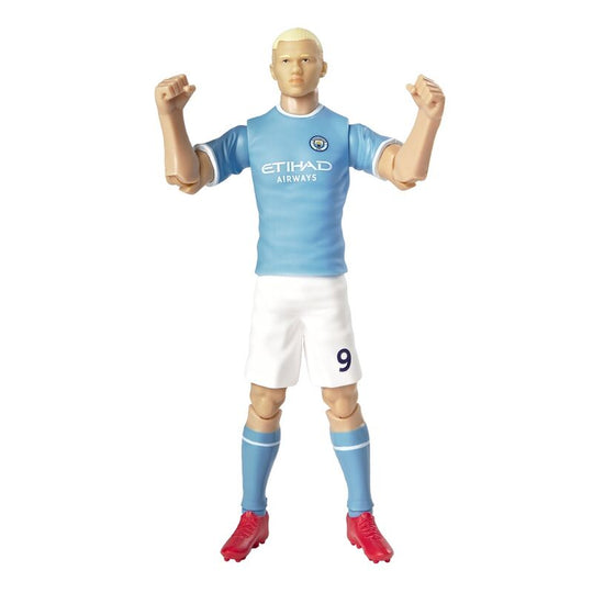 Figurine Haaland posée sur un socle avec logo Manchester City