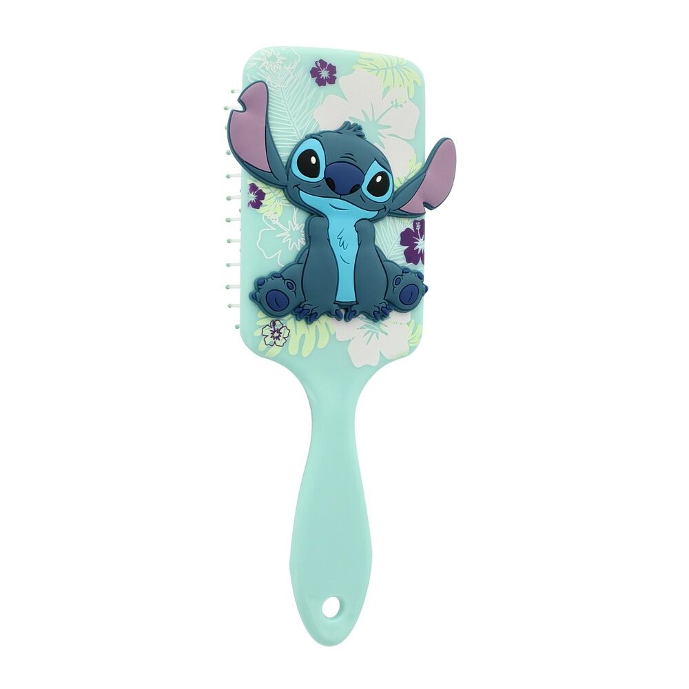 Détail des picots flexibles et du coussin pneumatique de la brosse Stitch Disney