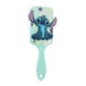 Détail des picots flexibles et du coussin pneumatique de la brosse Stitch Disney