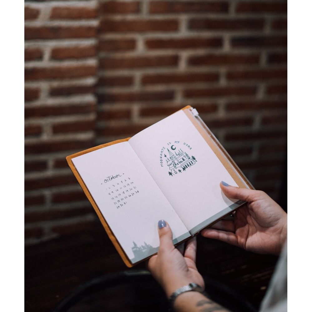 Logo officiel ERIK imprimé sur la couverture arrière du carnet Harry Potter