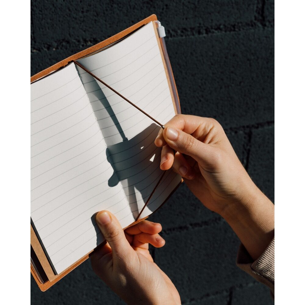 Feuilles lignées du carnet, parfaites pour prises de notes et écriture fluide