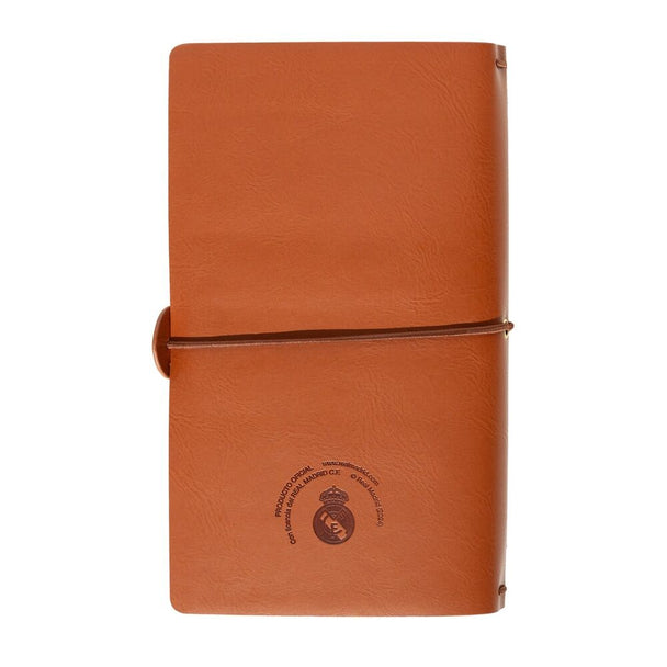 Vue de face du carnet Real Madrid avec logo et design officiel sur la couverture souple
