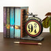 Vue latérale du serre-livres Harry Potter montrant la texture en résine et la taille compacte.