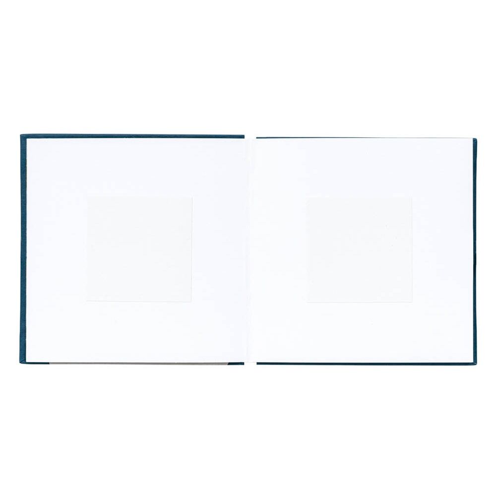 Page intérieure de l'album montrant les espaces autocollants pour photos