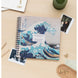 Photo de l'album posé sur une table avec des accessoires de scrapbooking autour