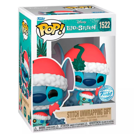 Figurine Funko POP Stitch déballant un cadeau dans sa boîte d'origine, vue de face avec détails colorés et expressifs
