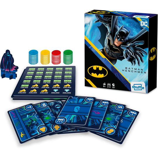 Joueurs en train de jouer au jeu de société Batman DC Comics sur une table en bois