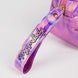 Trousse Hello Kitty My Melody posée sur une surface blanche montrant son design coloré
