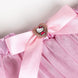 Détail du tissu polyester du tutu rose, doux et résistant pour enfant