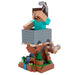 Support Cable Guy Minecraft Steve avec une manette PlayStation 5 DualSense posée dessus.