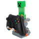 Présentation du support Creeper Minecraft sur bureau de gamer avec accessoires autour