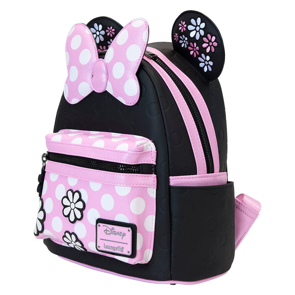 Sac à dos Loungefly porté sur le dos par une personne, mettant en valeur son design floral et ses couleurs vives