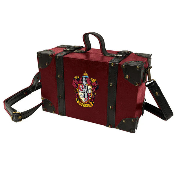 Malette Harry Potter Gryffindor rouge et or avec logo de la maison, vue de face sur fond blanc.