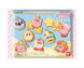 Porte-clés Kirby Cookie Surprise posé sur une surface en bois clair
