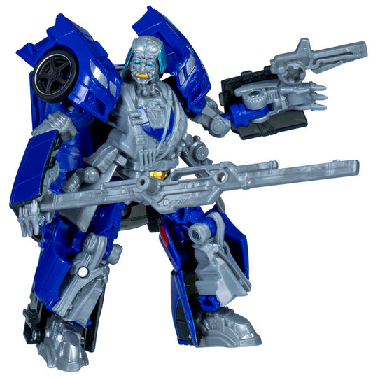 Vue rapprochée des armes attachées à la figurine Wheeljack en mode robot.