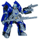 Vue rapprochée des armes attachées à la figurine Wheeljack en mode robot.