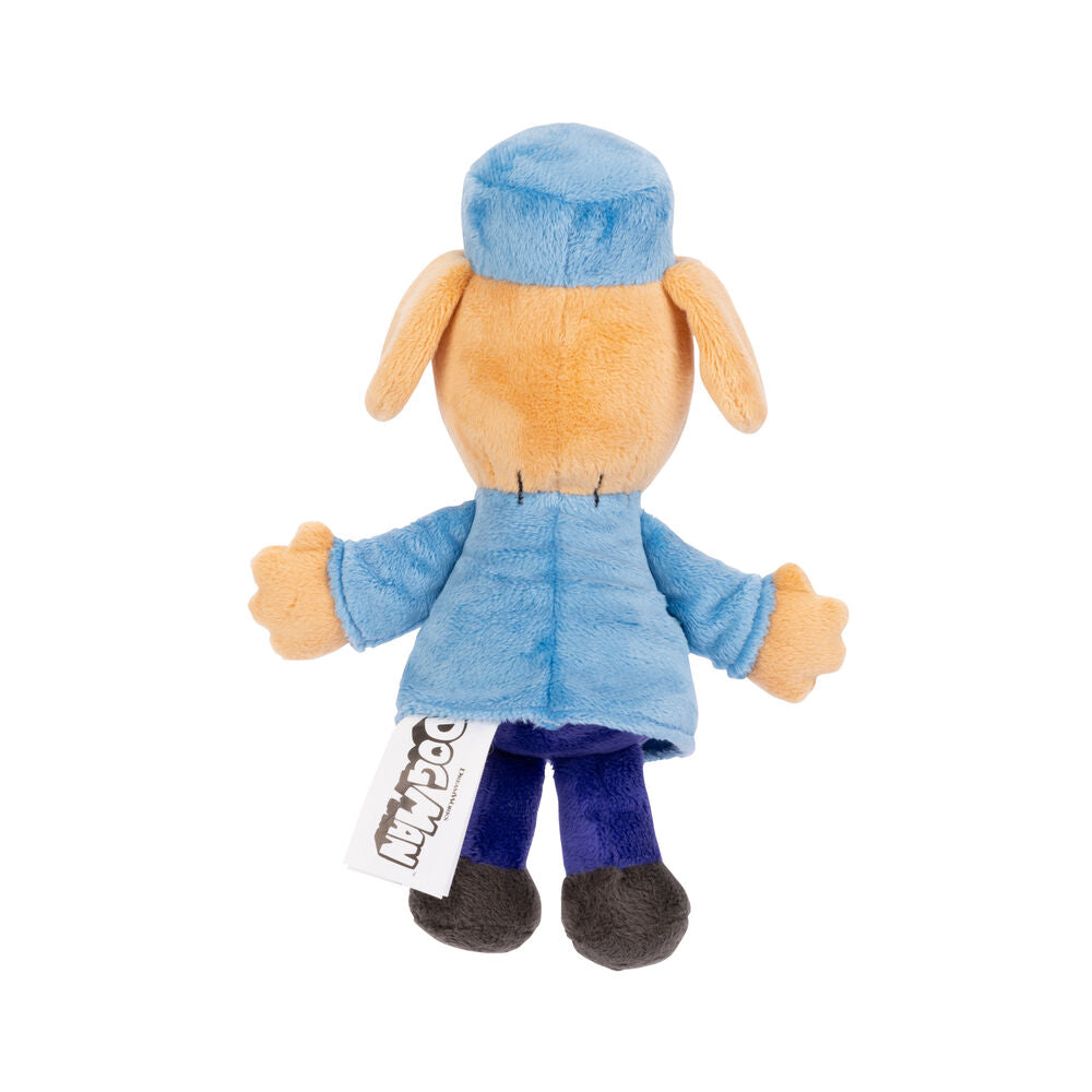 Gros plan sur le visage souriant du jouet peluche Dogman 25cm
